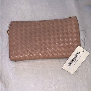 Hand clutch with attachable strap